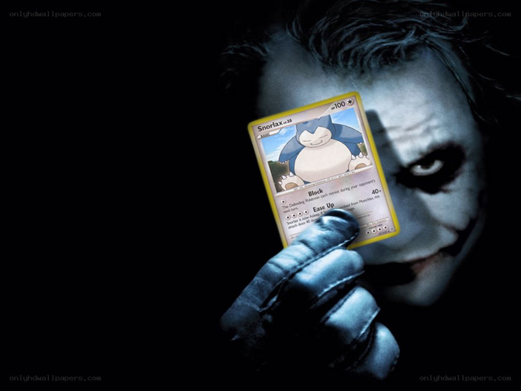 Joker holding Snorlax card