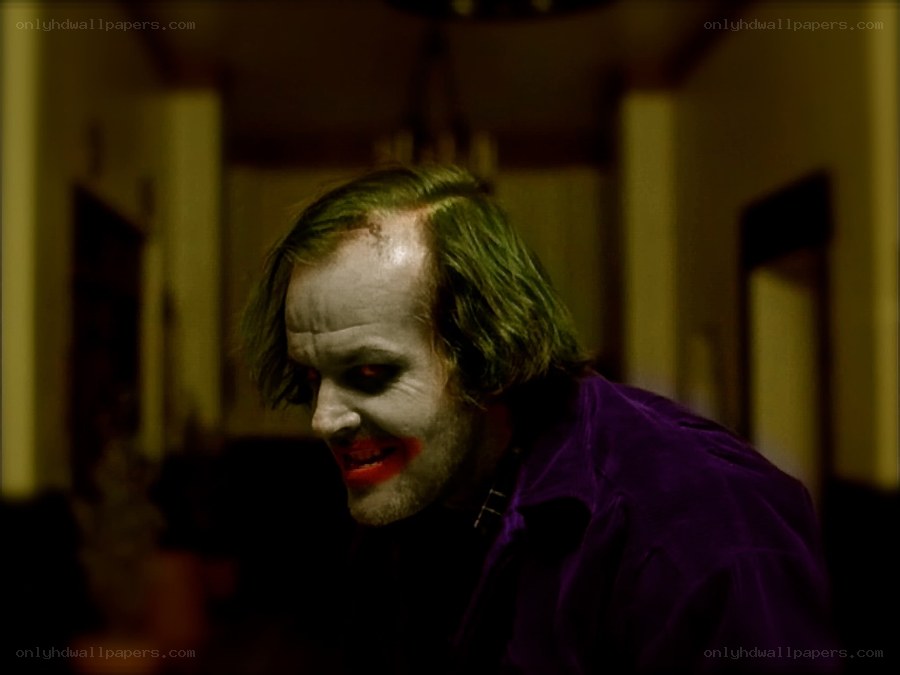 Joker in a dimly lit room