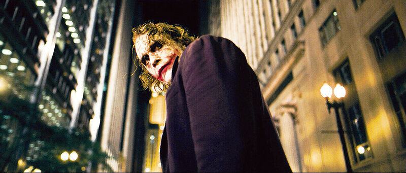 Joker in city at night