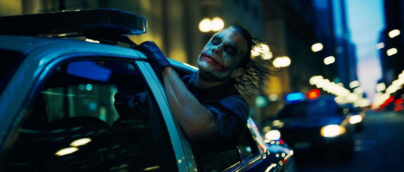 Joker in police car
