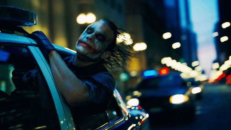 Joker Leaning from Car