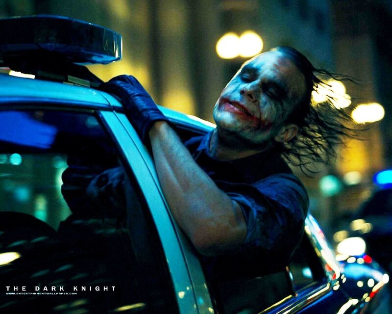 Joker Leaning on Car — Blue, Dramatic, Night, Photograph