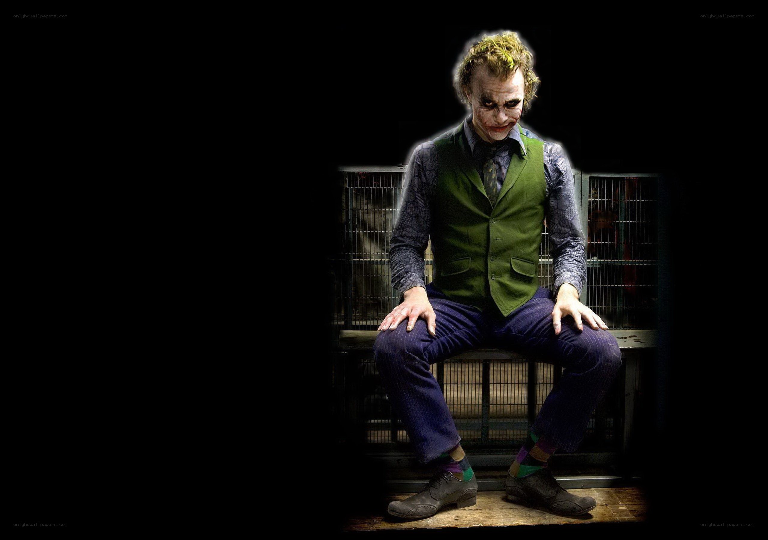 Joker sitting on a bench