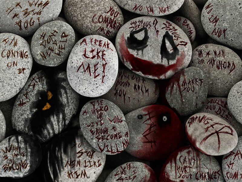 Joker-themed rocks with quotes