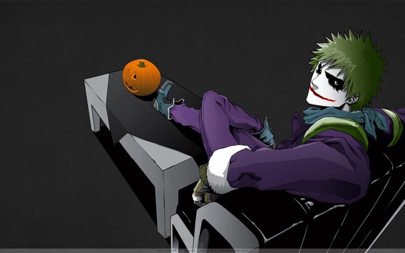 Joker with pumpkin on bench