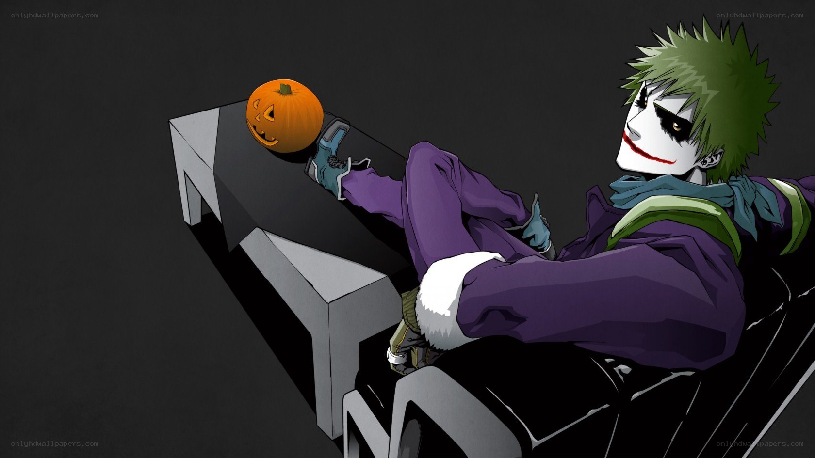Joker with pumpkin on table