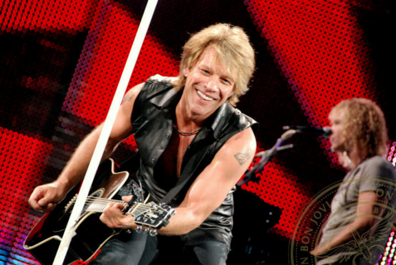 Jon Bon Jovi performing on stage