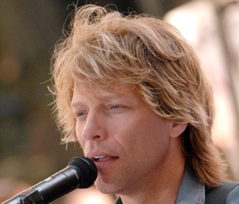 Jon Bon Jovi singing into microphone