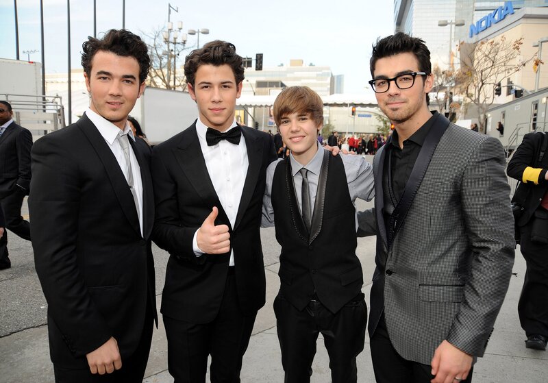 Jonas Brothers and Justin Bieber at event