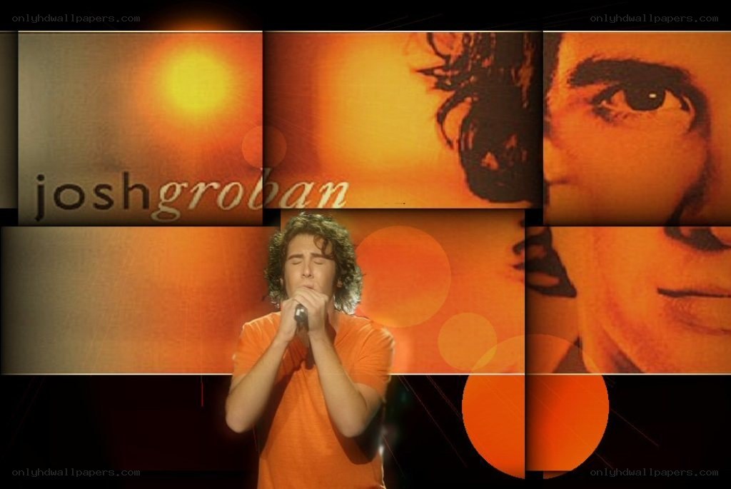 Josh Groban performing on stage