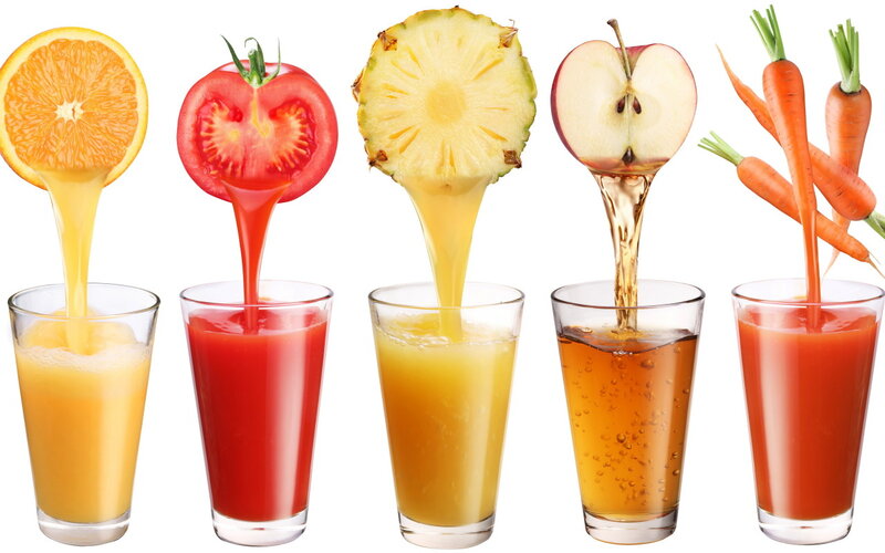 Juices Being Poured — Orange