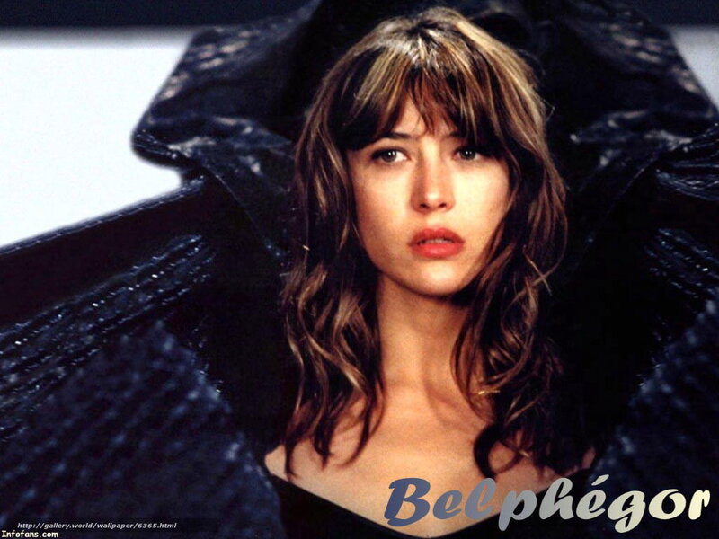Julie Gayet in a black outfit