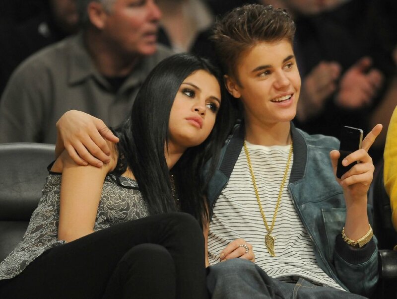 Justin Bieber and Selena Gomez at a game