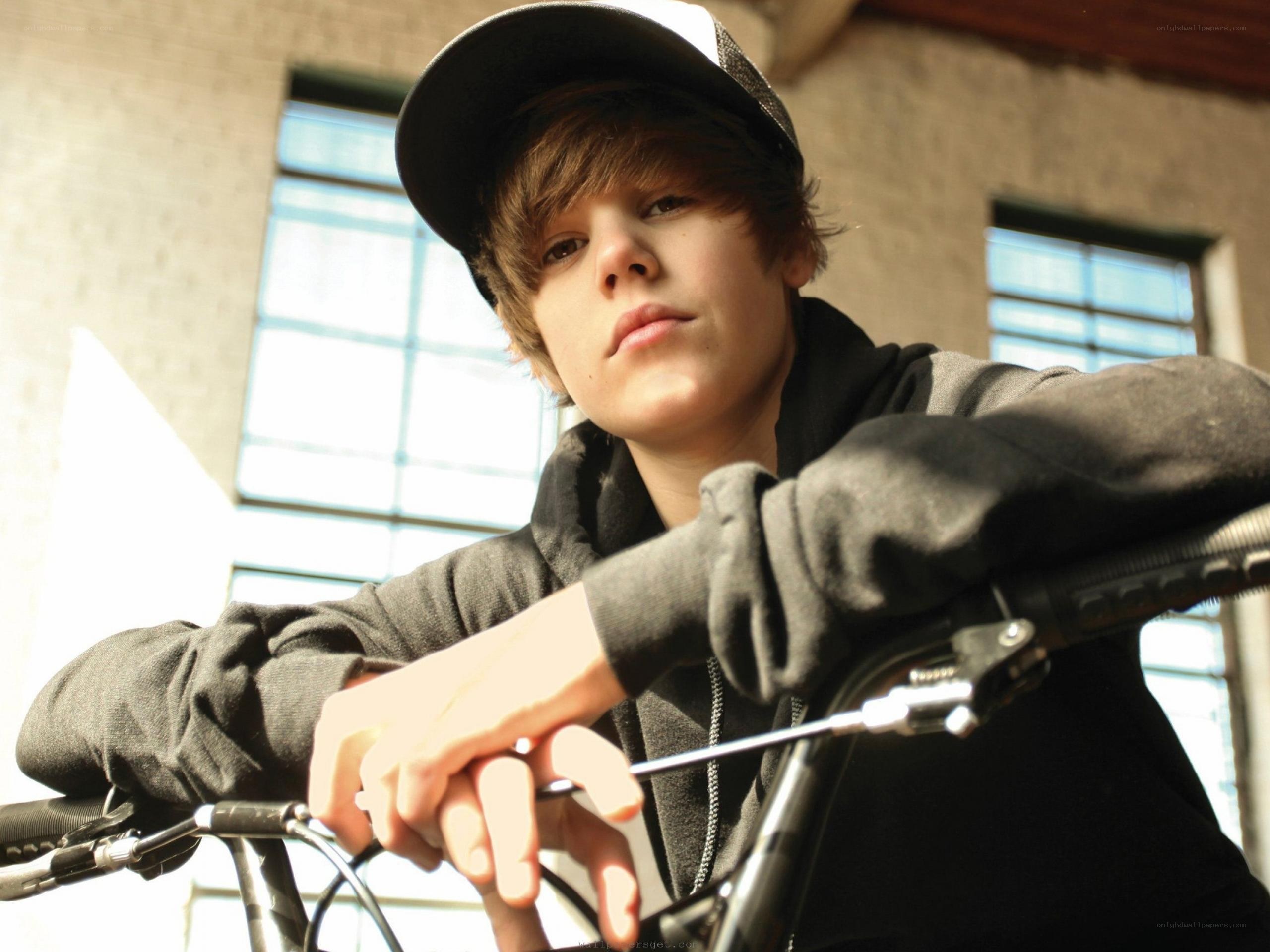 Justin Bieber on a bicycle