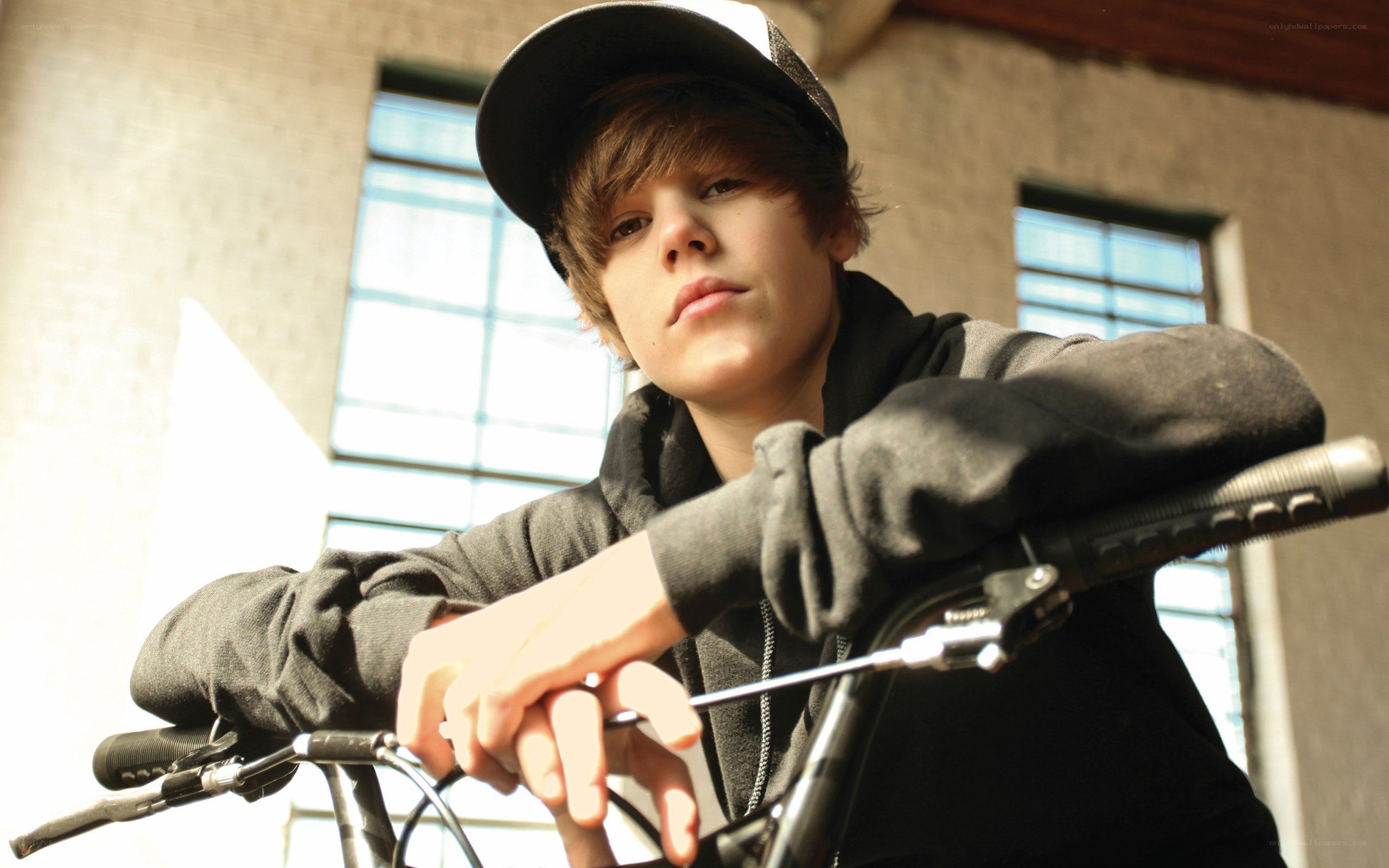 Justin Bieber on a bicycle