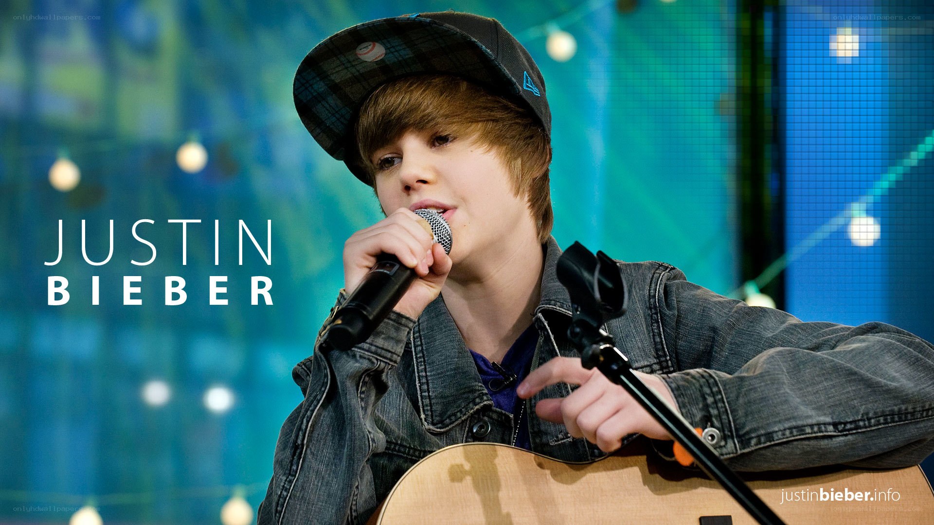 Justin Bieber singing with guitar