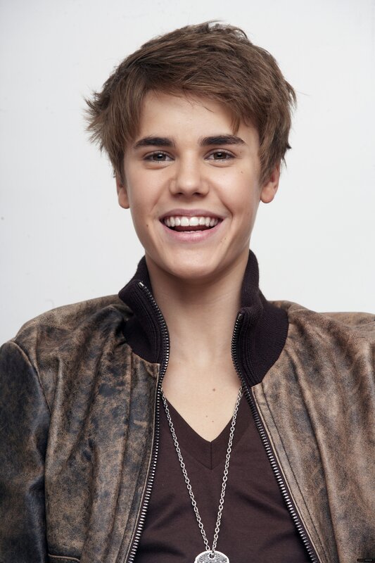 Justin Bieber smiling in jacket