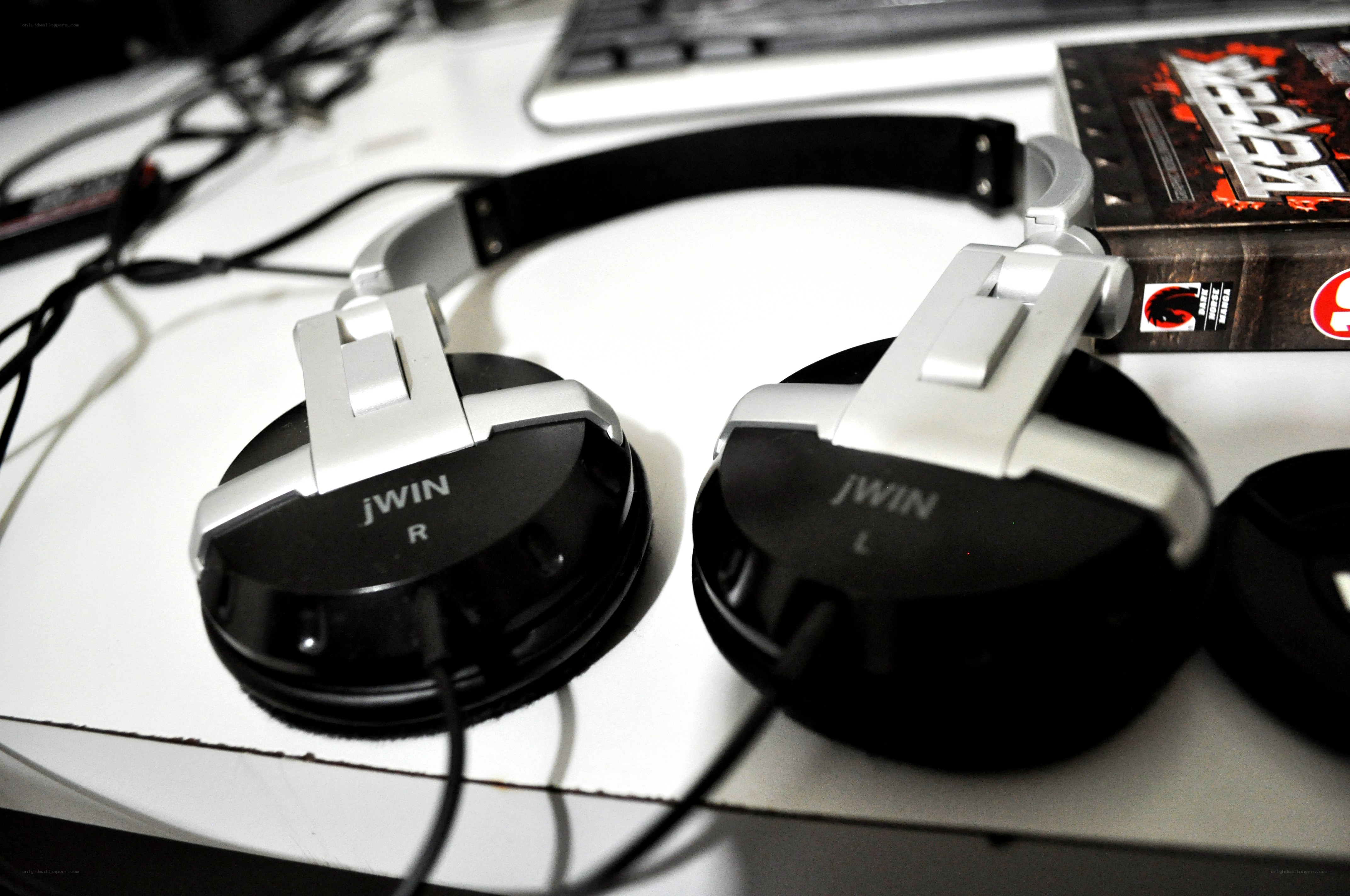 Jwin headphones on a desk
