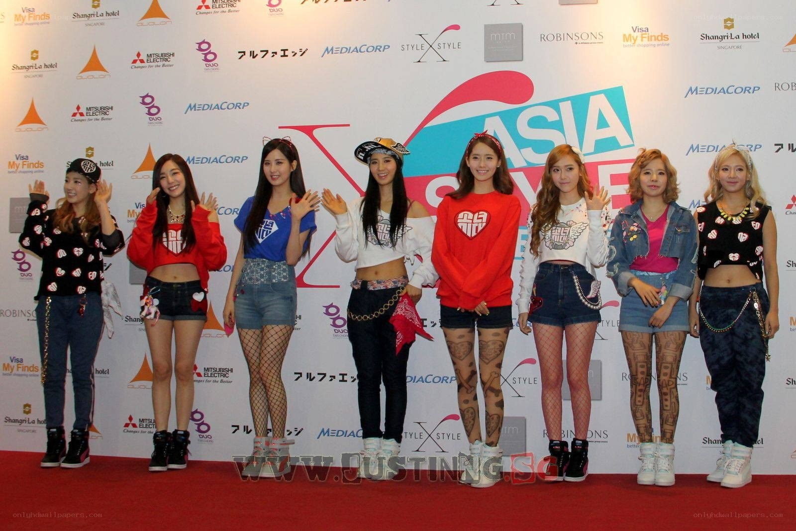 K-pop group at red carpet event