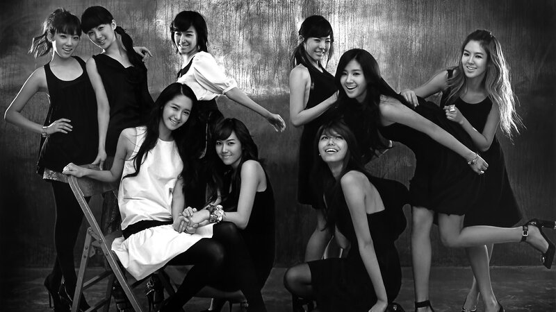 K-pop group black and white photo