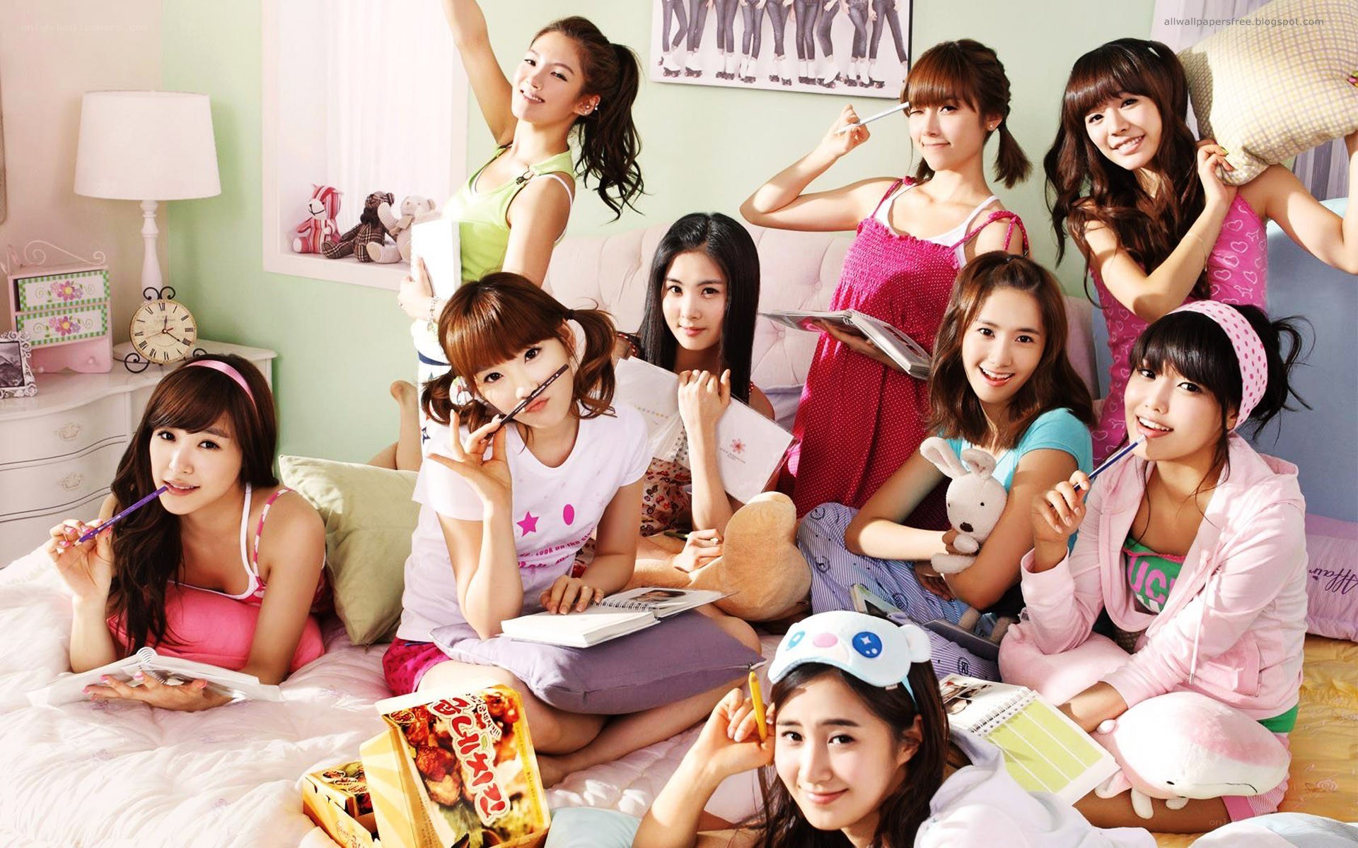 K-pop group in bedroom