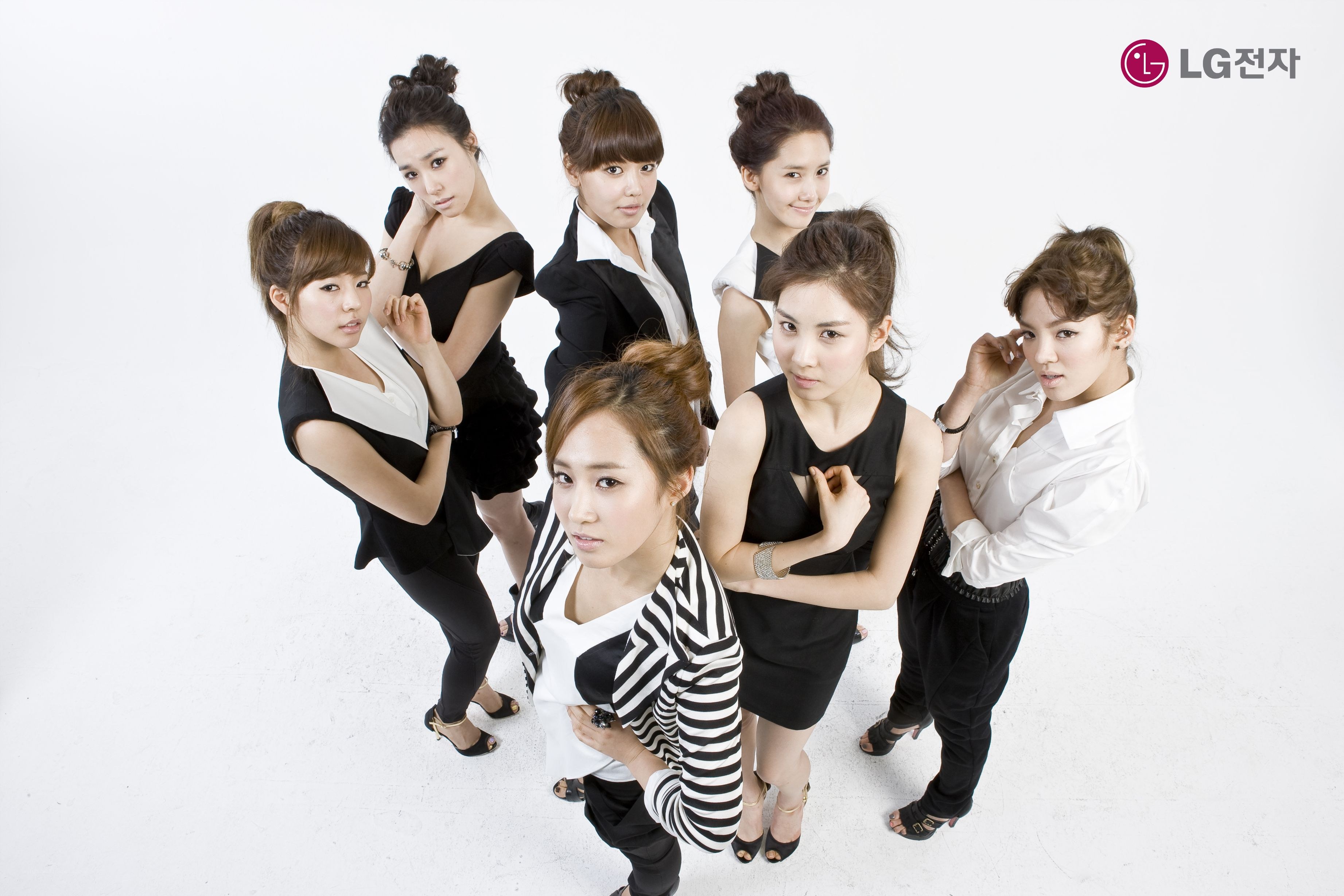 K-pop group in black and white