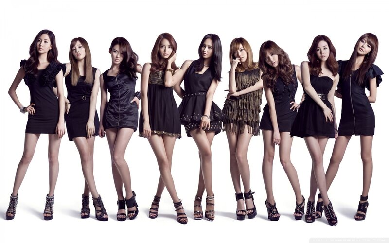 K-pop group in black dresses