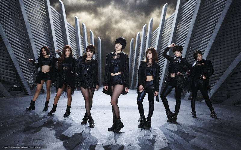 K-pop group in black outfits