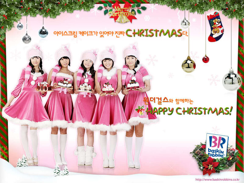 K-pop group in Christmas outfits