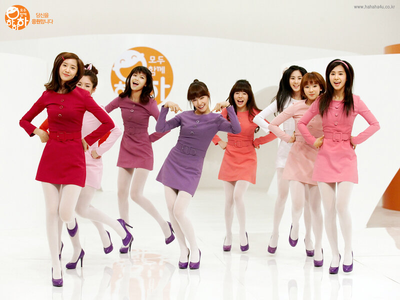 K-pop group in colorful dresses