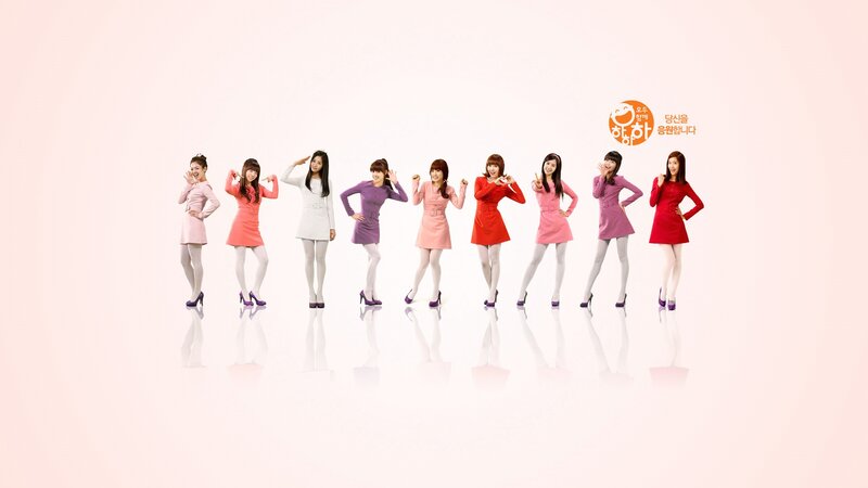 K-pop group in colorful dresses