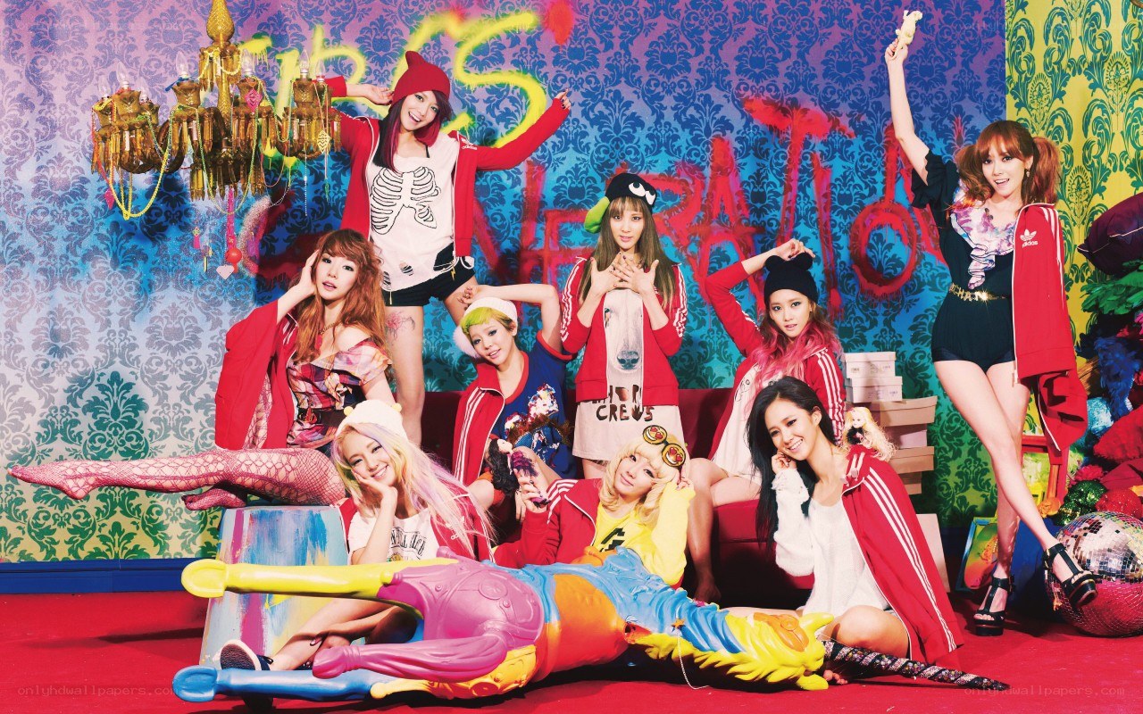 K-pop group in colorful studio