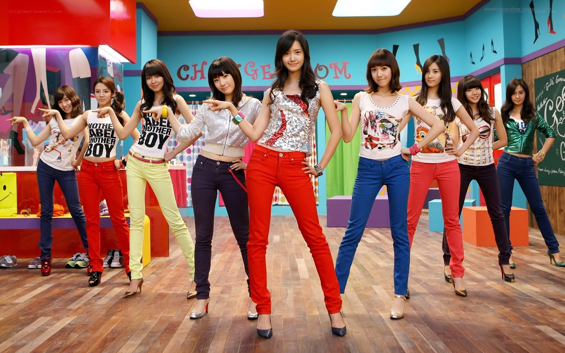 K-pop group in colorful studio