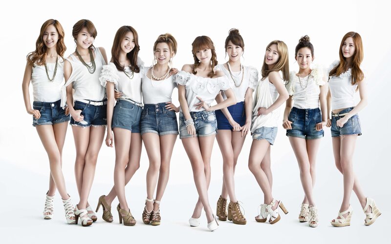 K-pop group in denim and white
