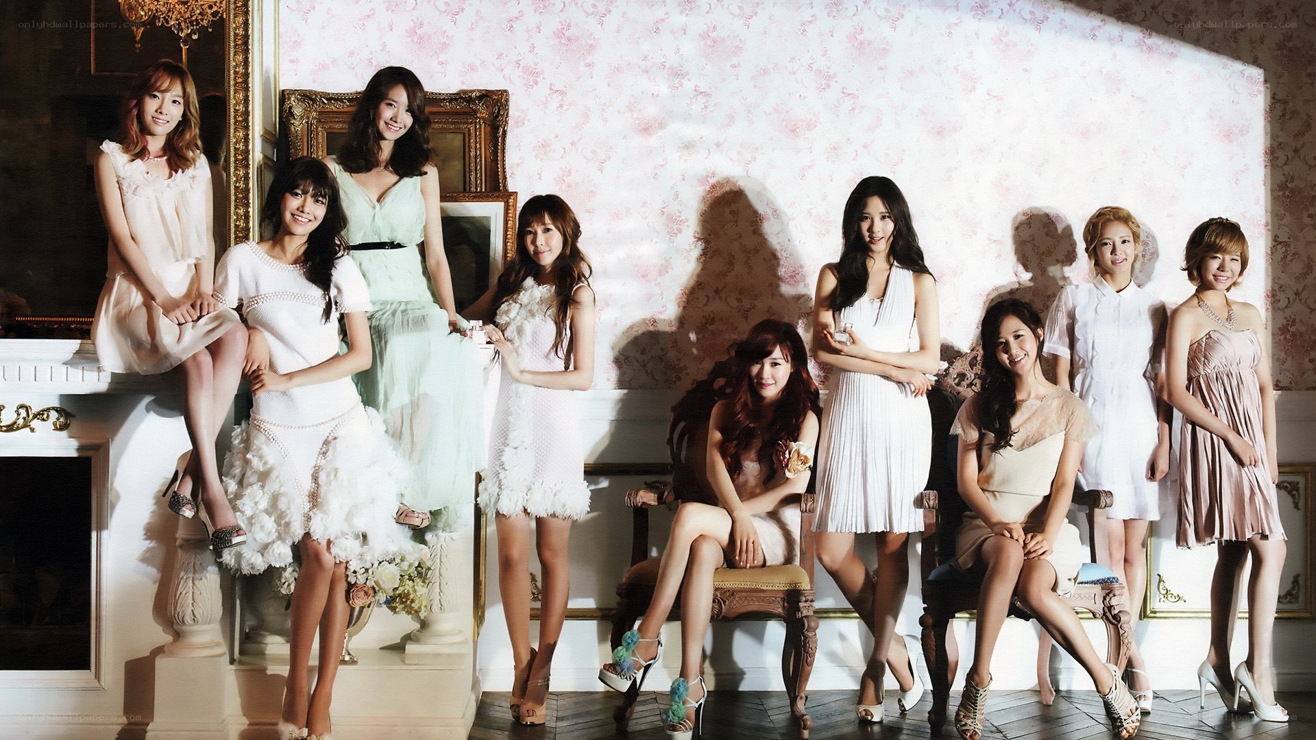 K-pop group in elegant dresses