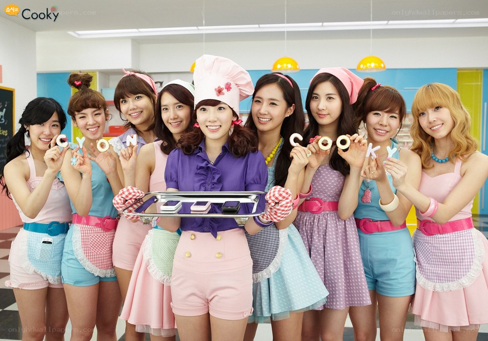 K-pop group in kitchen outfits