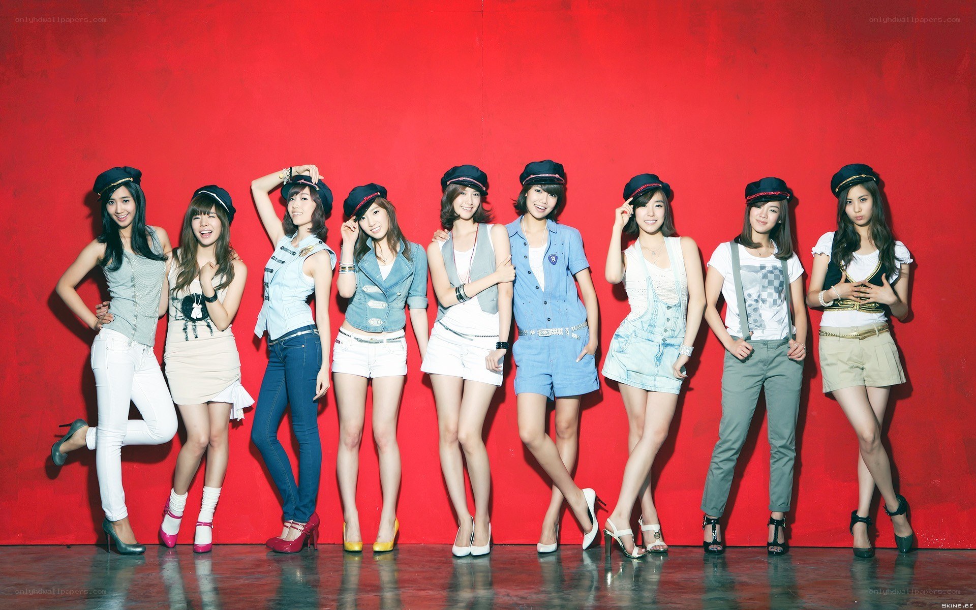 K-pop group in matching hats