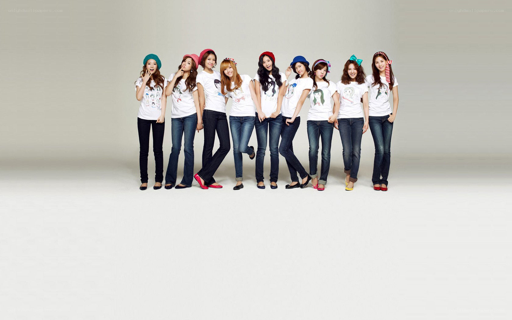 K-pop group in matching outfits