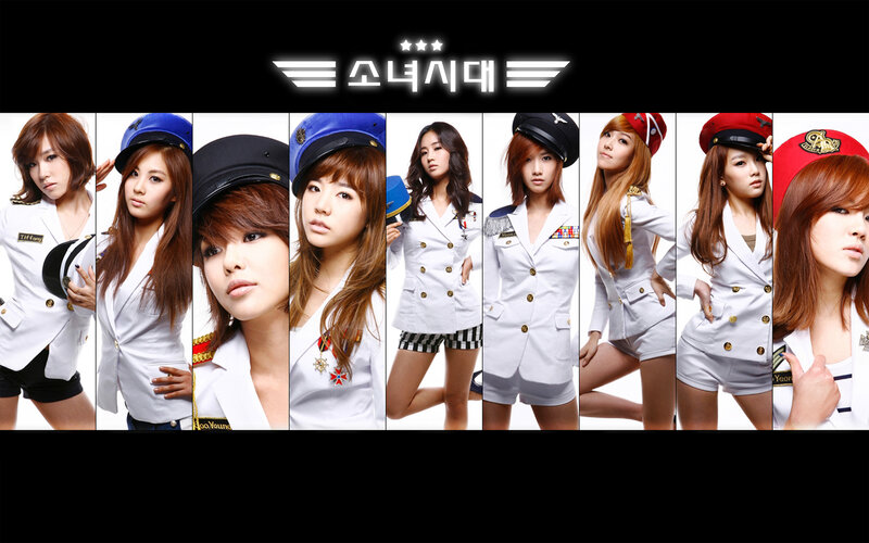 K-pop group in military-style uniforms