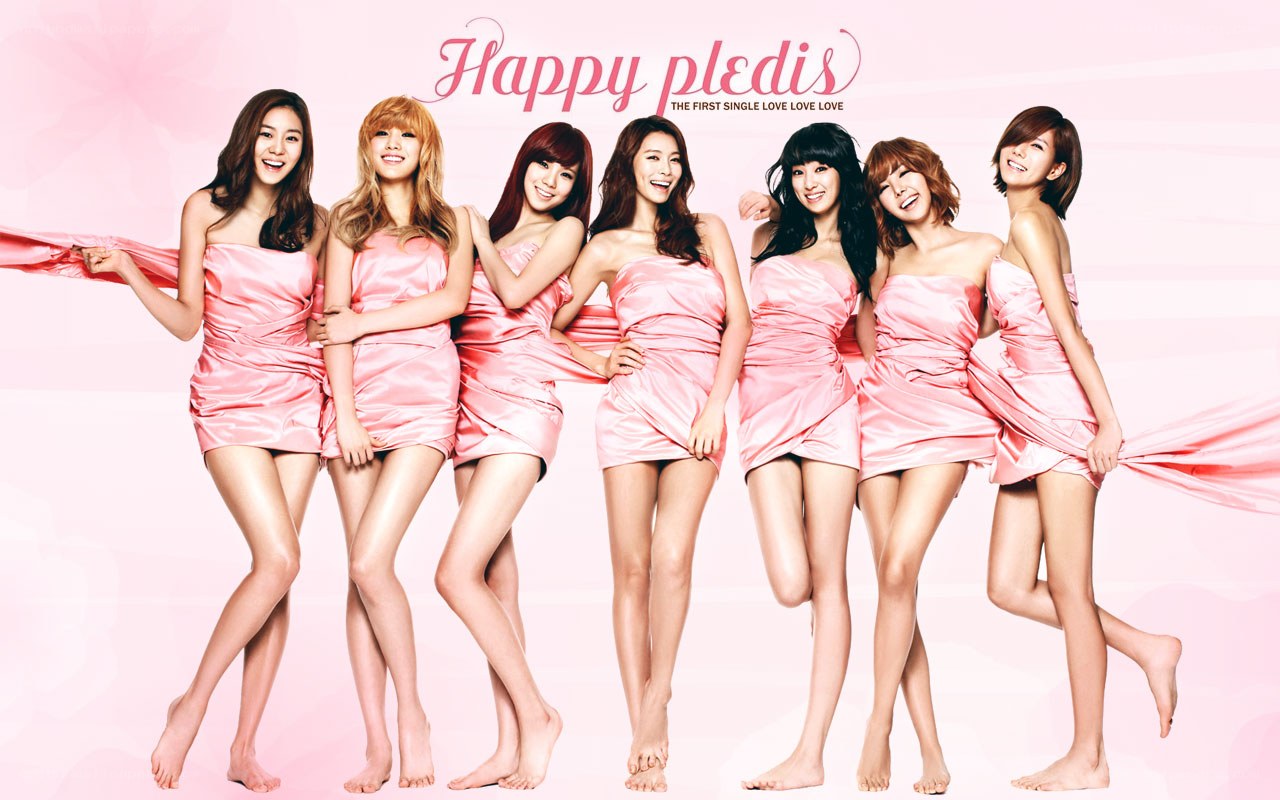 K-pop group in pink dresses