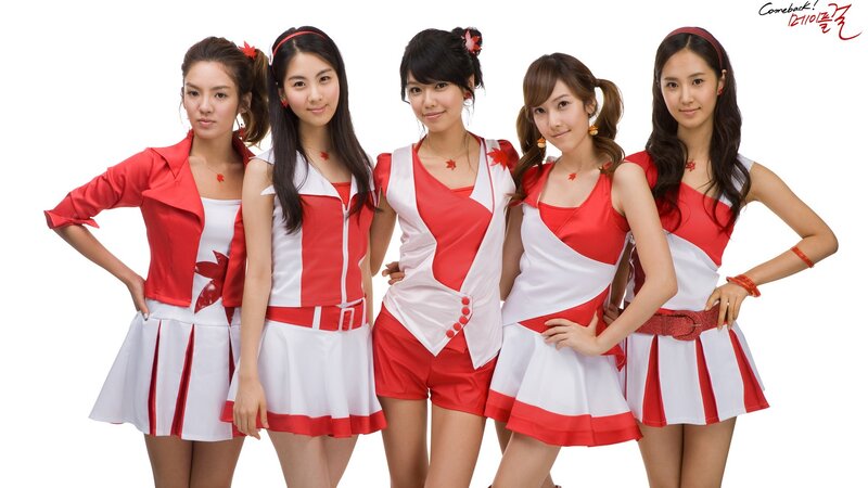 K-pop group in red and white outfits