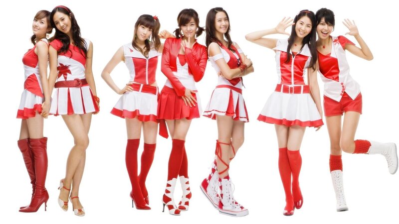 K-pop group in red and white outfits
