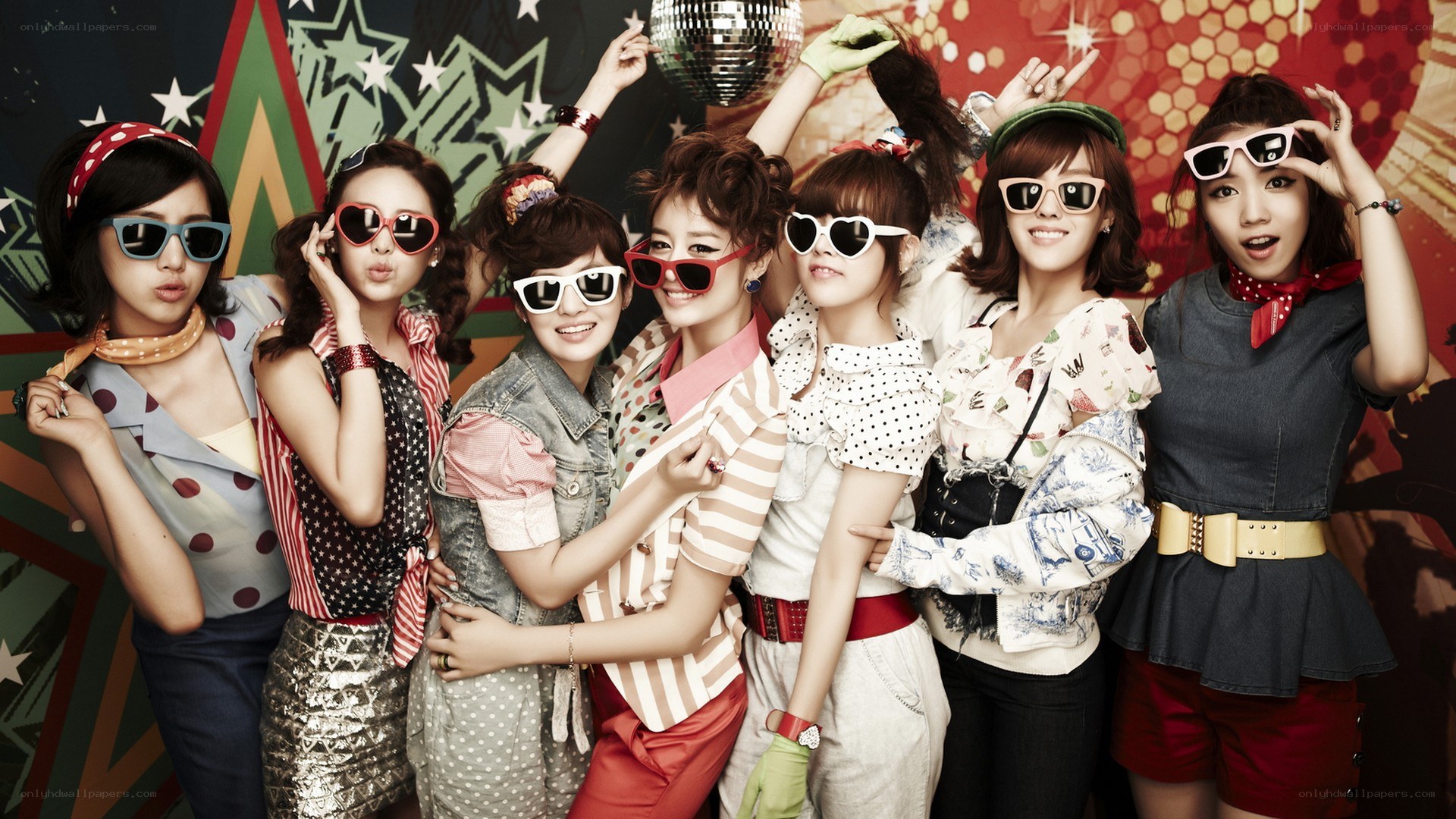 K-pop group in retro sunglasses