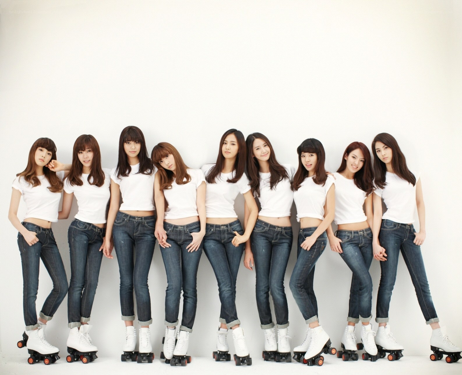 K-pop group in roller skates