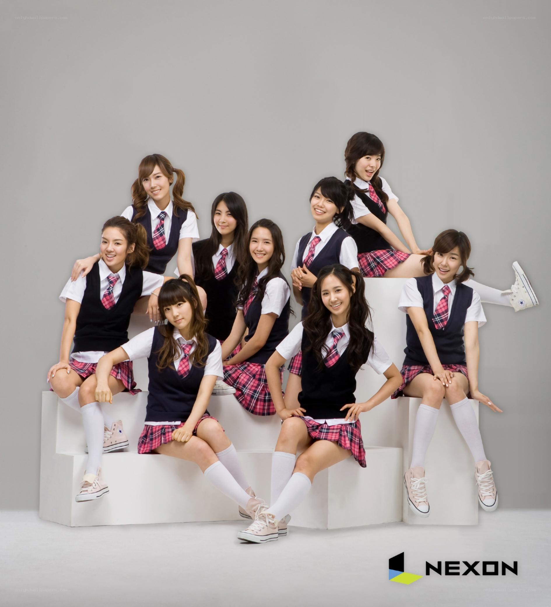 K-pop group in school uniforms