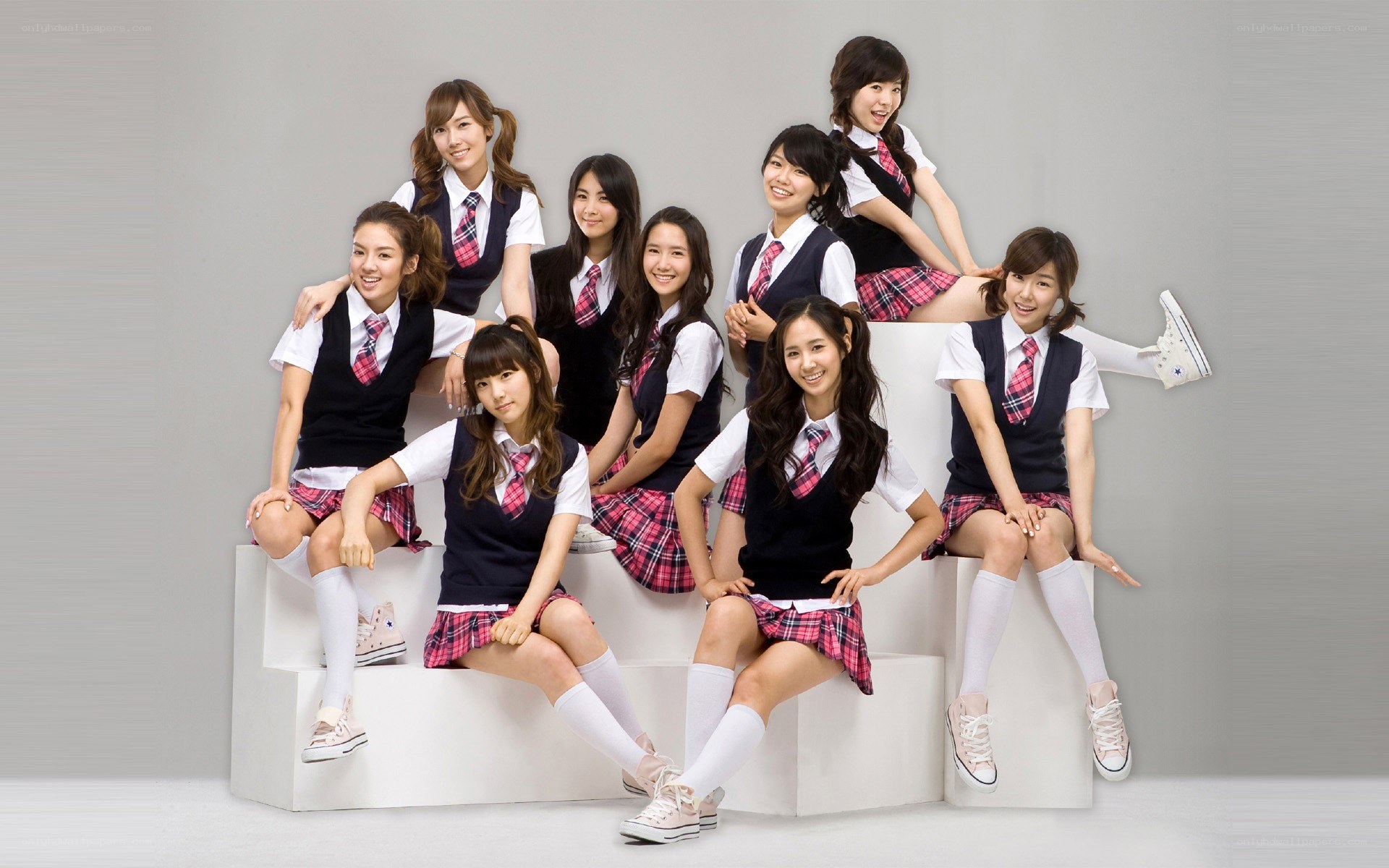 K-pop group in school uniforms
