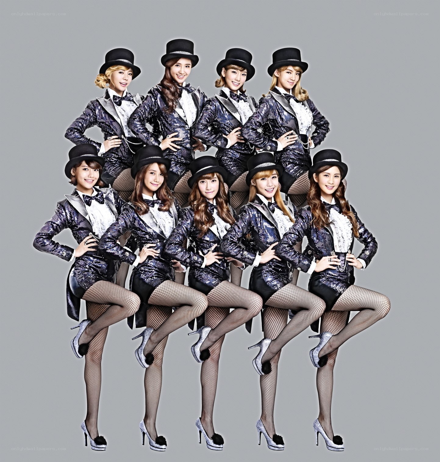 K-pop group in sequined suits