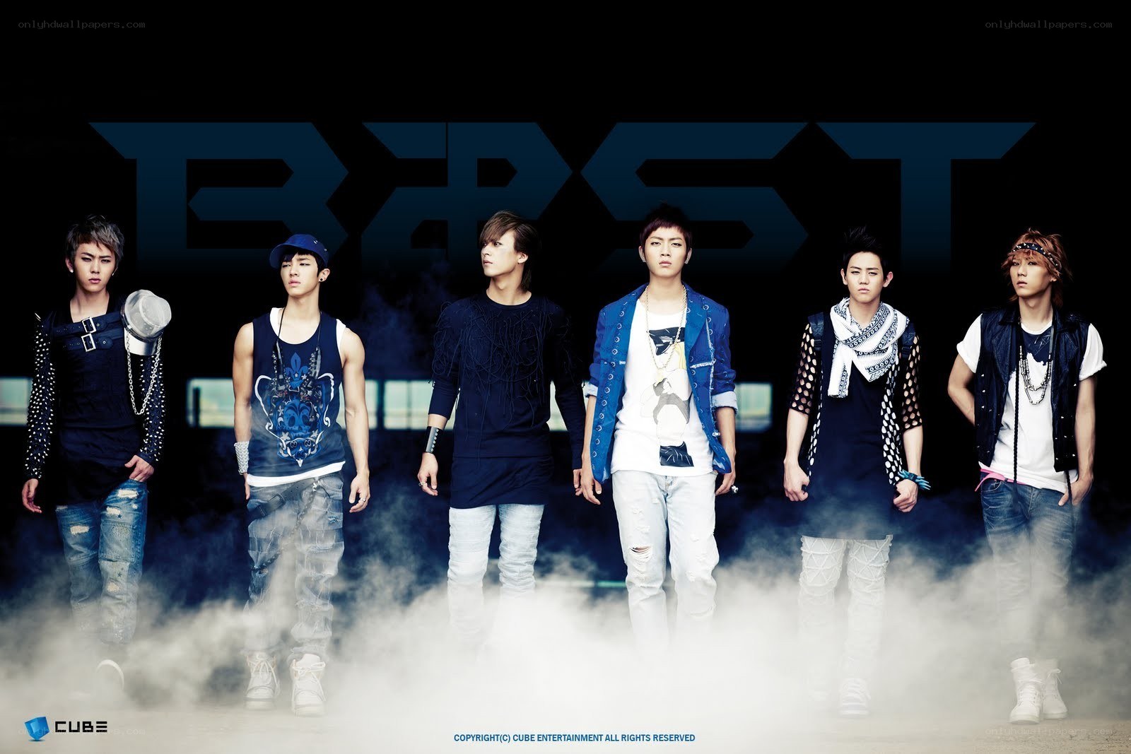 K-pop group in smoky setting