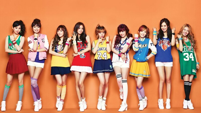 K-pop group in sports jerseys