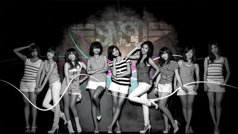 K-pop group in striped outfits